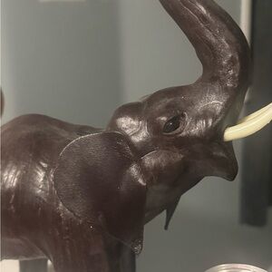 1 brown 2 black raised truck leather wrapped elephants